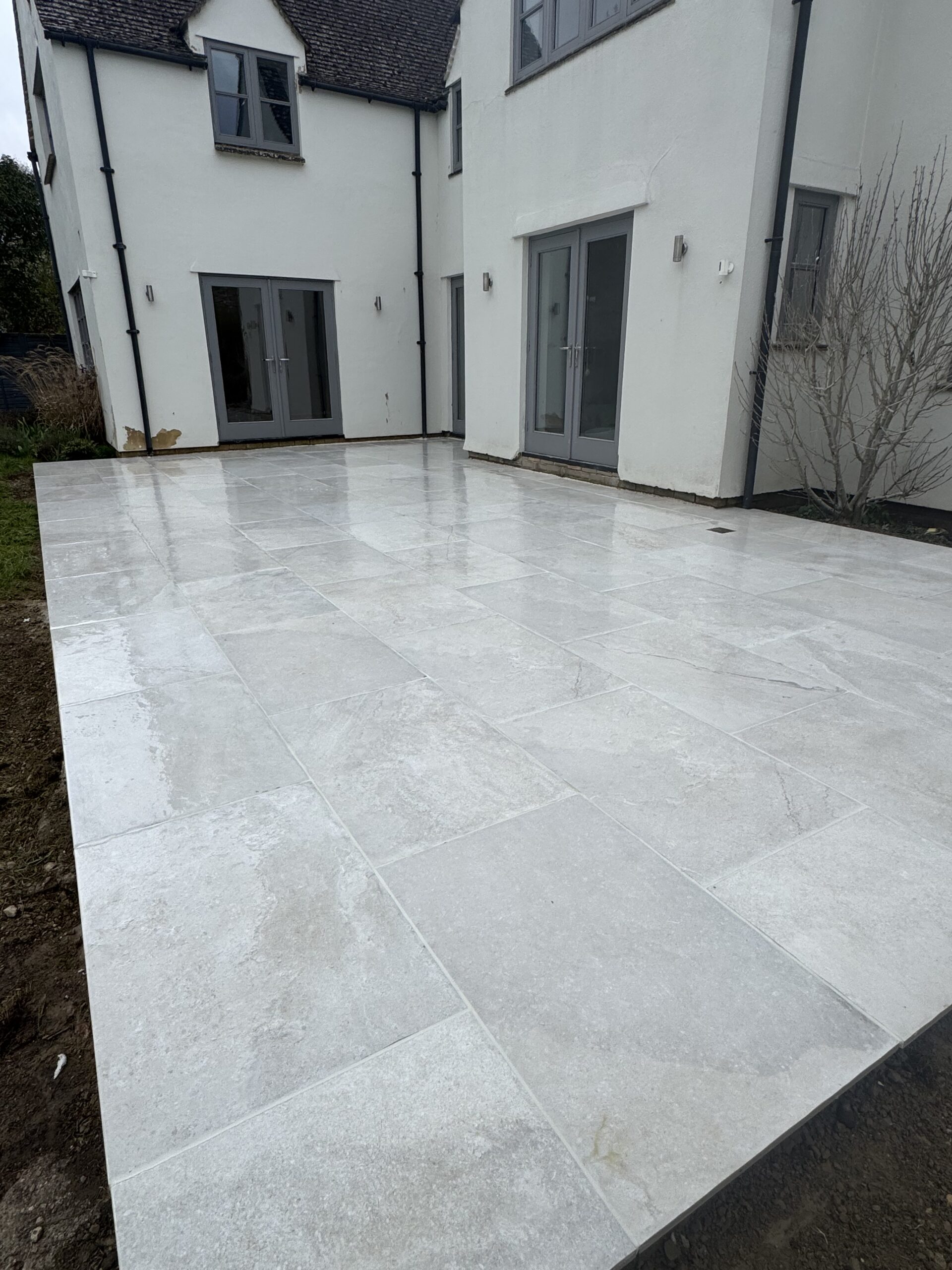 porcelain patio grey laid in charlton kings